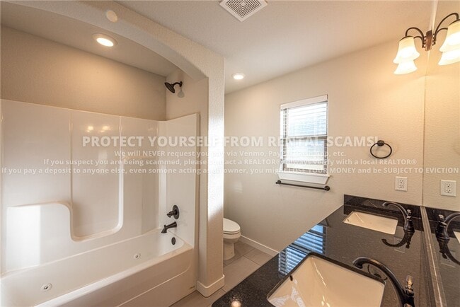 Building Photo - 4491 W Newton Ave