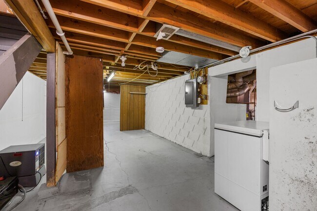 Building Photo - 4 Bedroom Remodeled with 2 Stall Detached Garage