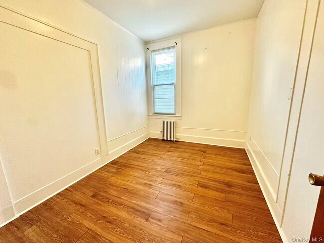 Building Photo - 18-17 125th St