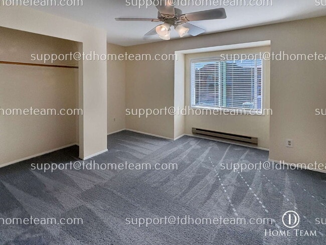Building Photo - "Charming 2-Bed Townhouse with Gleaming Hardwood Floors in Vibrant Seattle Neighborhood"