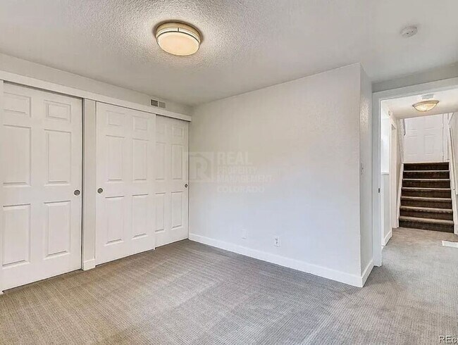 Building Photo - 7110 E 63rd Ave