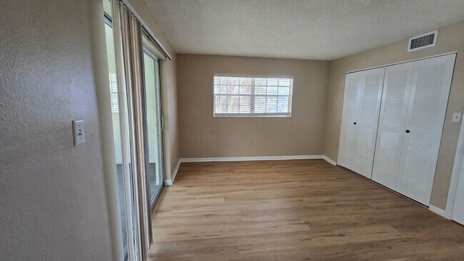 Building Photo - Annual Updated 1BR/1BA Condo – New Interior Finishes, Located on the 2nd Floor