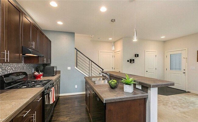 Building Photo - A Modern In-city Style with Comfort of the Suburbs Single Family Detached Condo