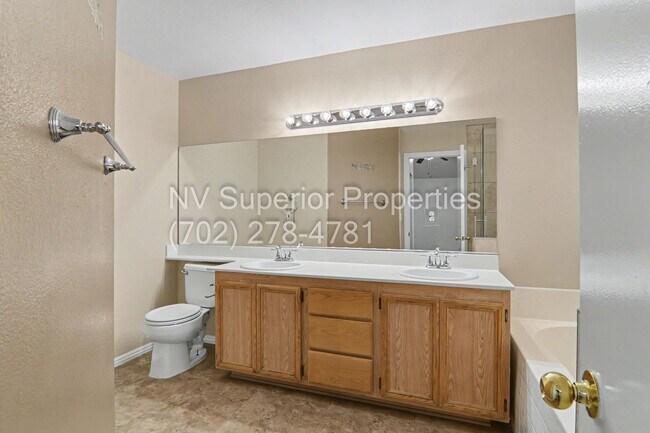 Building Photo - NW!! 4 bedrooms!! Bed & Bath DownStairs!!! RV Parking!!! Synthetic Grass Front yard!! Real Grass ...