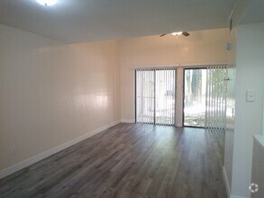 Building Photo - Spacious two-bedroom, 2-bath with a bonus ...