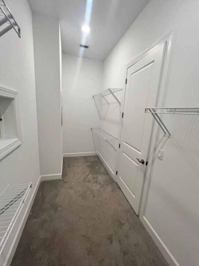 Building Photo - STUNNING LAKEFRONT 3 BEDROOM, 2.5 BATH HOM...
