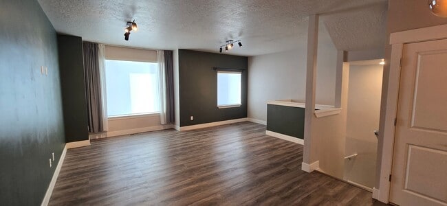 Building Photo - Come check out this beautiful 3 story town...