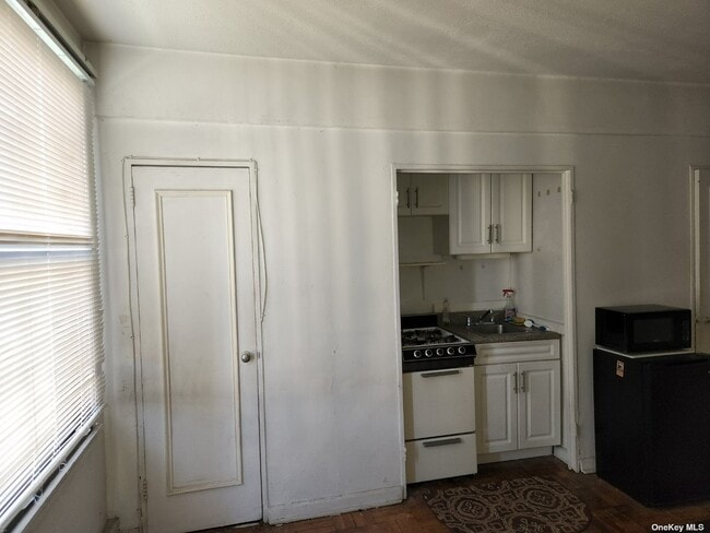 Building Photo - 98-51-98-64 64th Ave