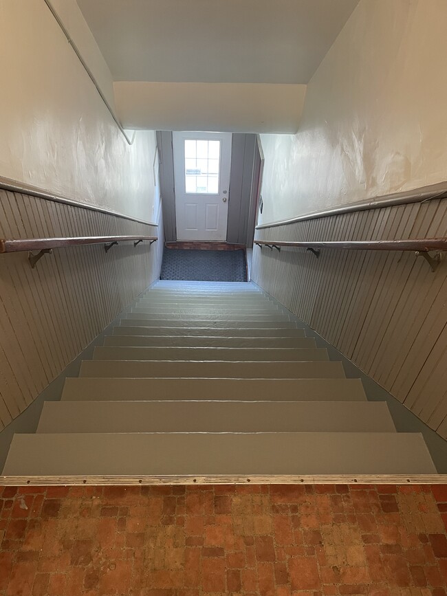 Inside front stairway - 204 E 4th St