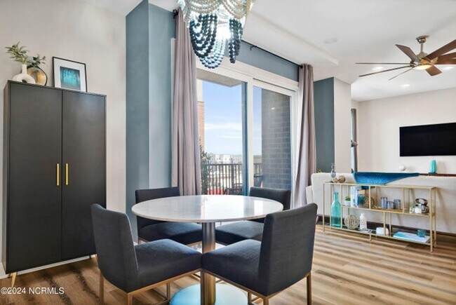Building Photo - Welcome to your dream condo in the heart o...