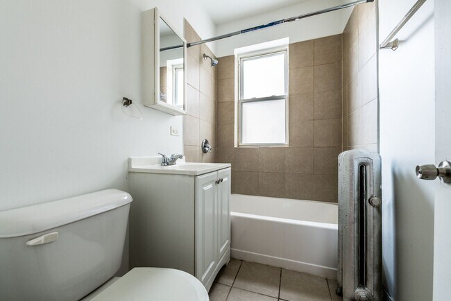 Building Photo - 7825-7831 S Emerald Ave