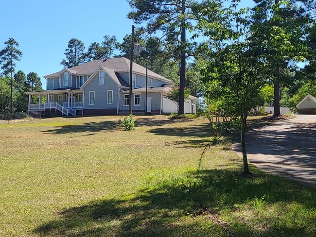 Building Photo - Serene 3-Acre Homestead in Sanford, NC – Ideal for Country Living!