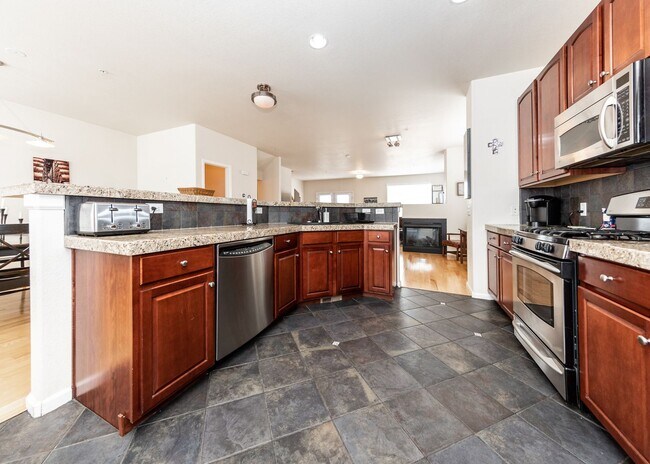 Building Photo - Downtown 3 Bedroom Townhome with 2 Car Garage