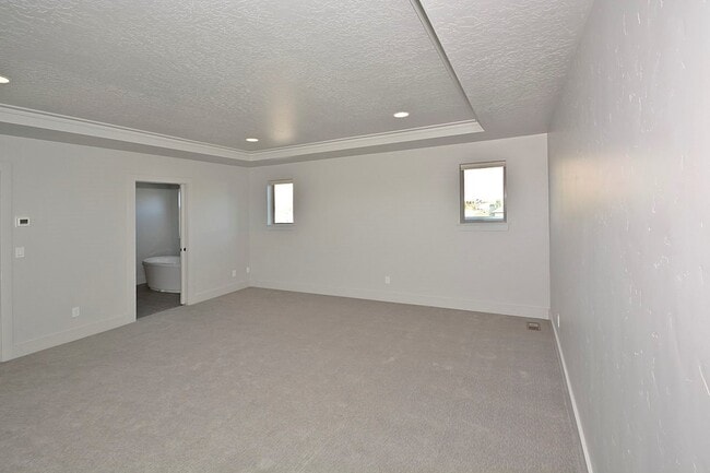 Building Photo - One of a Kind-3 Bedroom and 3 Bathroom Luxury Townhouse in Harris Ranch.