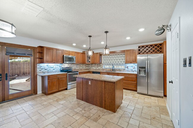 Building Photo - Sign your lease and receive a FREE 50" TV!!!  "Spacious 4-Bedroom Retreat with Fireplace in Charm...