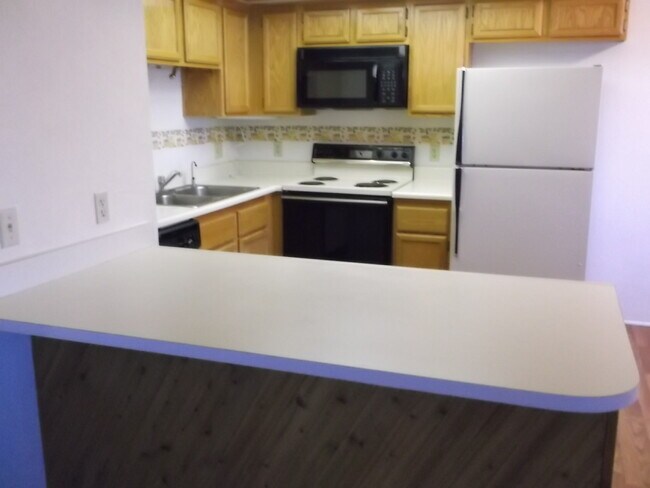 Building Photo - APPLICATION APPROVED- Rock Springs I Condo...