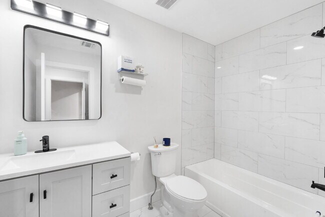 Building Photo - Movie in special, first 1/2 month rent is FREE! Charming 2-Bedroom Condo with 2 Full & 2 Half Bat...