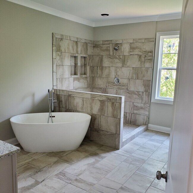 Building Photo - COMING SOON! Stunning New Home in Prime Mi...