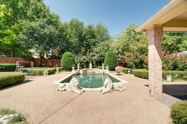 Building Photo - "Stately Gated 5-Bedroom Estate With Pool, Custom Details & Abundant Living Space!"