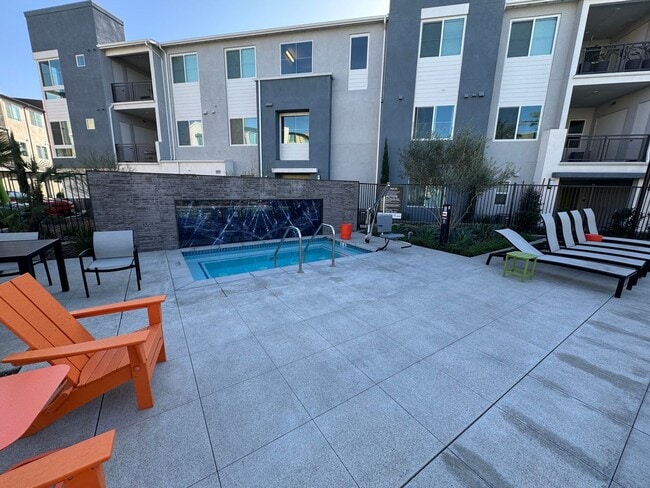Building Photo - Brand New 1 bedroom, 1 bath Townhome with 2 car tandem garage for lease