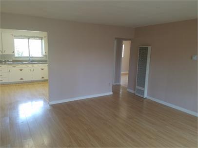 2 Bed/1Ba Wood Floor Living Room - Eaton Terrace Apartments
