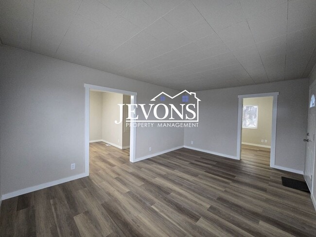 Building Photo - 3 bedroom home with washer and dryer – 1-acre lot next to an orchard – Large and small pets allowed!