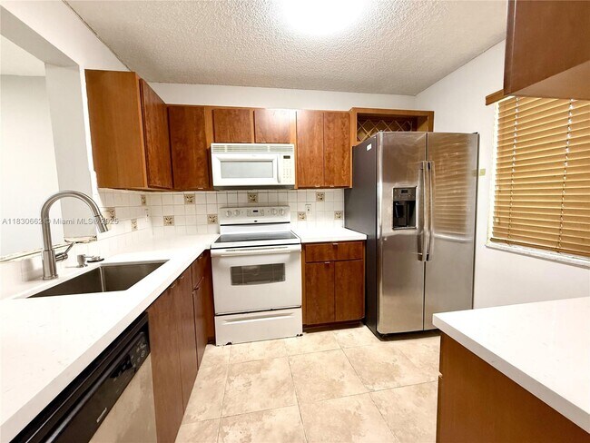 Building Photo - 8550 N Sherman Cir
