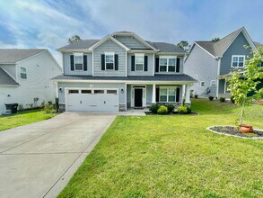 Building Photo - Spacious 4 Bedroom, 2 And A Half Bath Nest...
