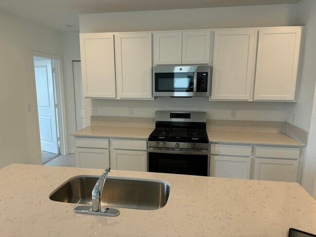 Building Photo - 5892 NW Sweetwood Dr