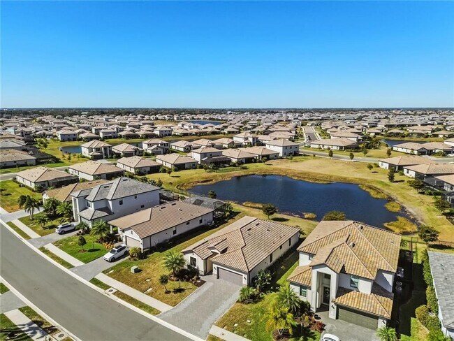 Building Photo - 15719 Islandwalk Ave