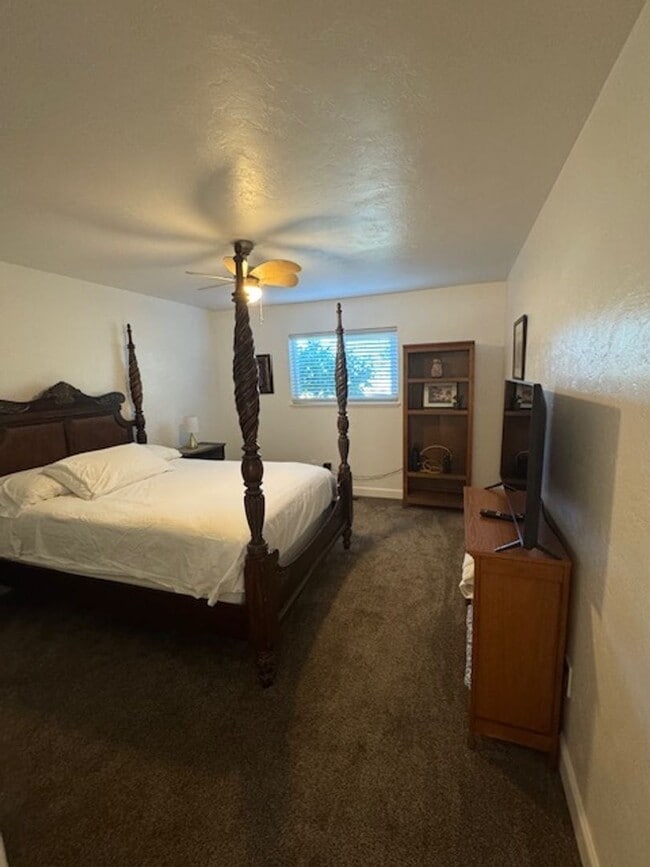 Building Photo - Beautifully Furnished and Recently Painted, Corner Lot Home Features a Fenced Backyard with an In...