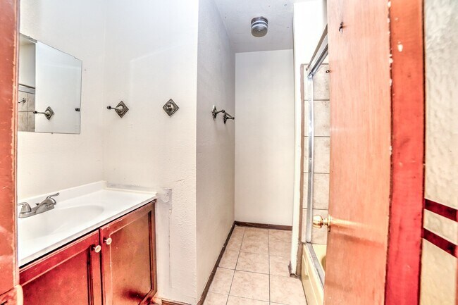 Building Photo - 4824 N Xanthus Ave