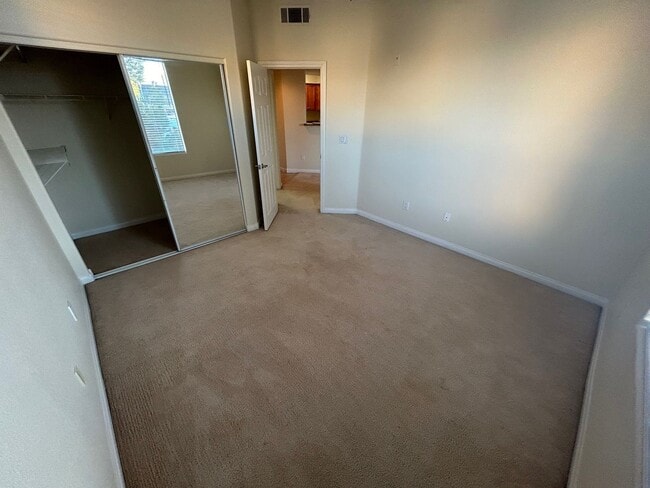 Building Photo - ADORABLE 2 BEDROOM 2 BATHROOM CONDO LOCATED IN A GATED COMMUNITY