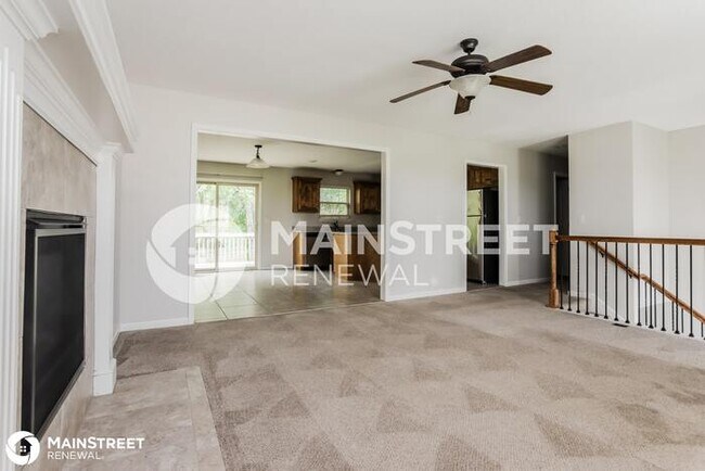 Building Photo - 411 Wiltshire Dr, Raymore, MO 64083