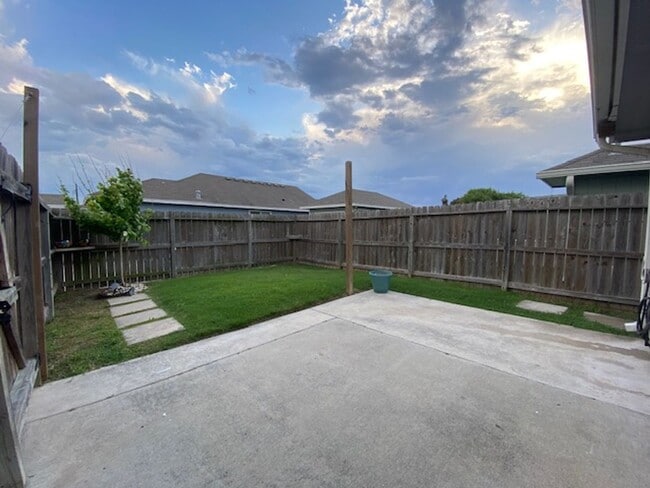 Building Photo - WELCOME TO YOUR CHARMING HOME AT THE COTTA...