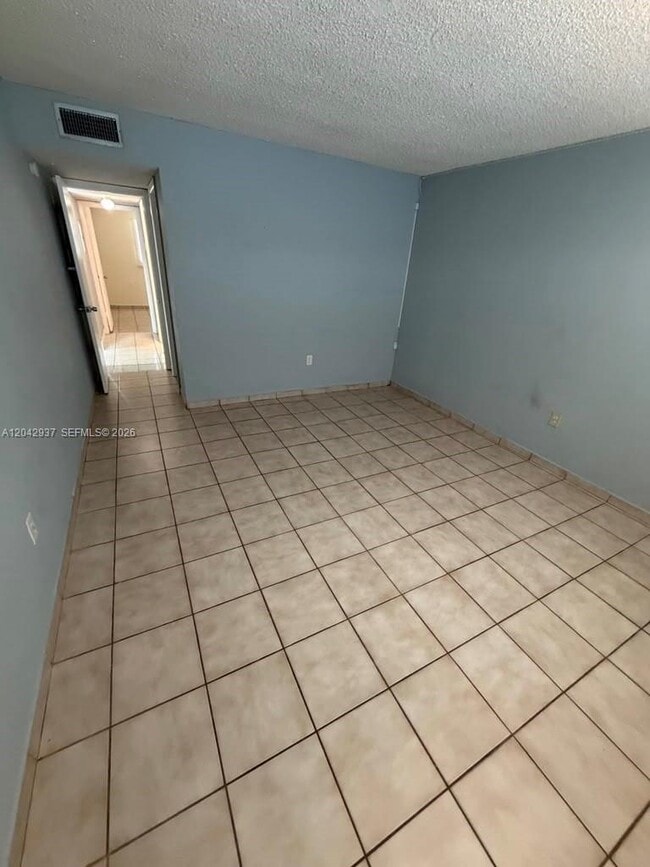 Building Photo - 6070 W 19th Ave