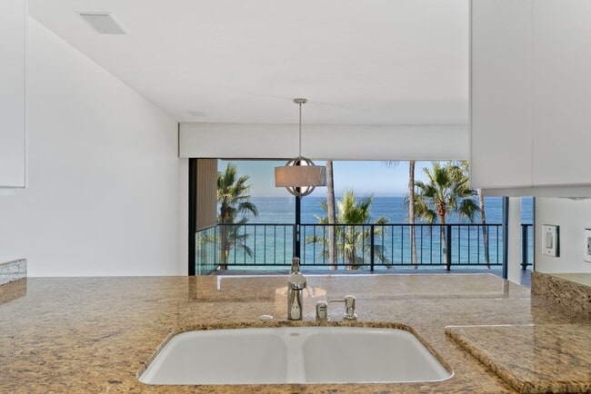 Building Photo - Discover a Coastal Sanctuary at Laguna Royale, Laguna Beach. Comes with 2 Parking Spaces!