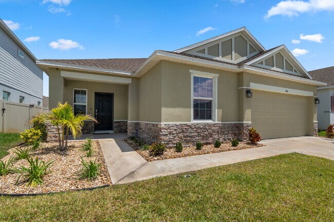 Building Photo - Elegant 3-Bed, 2-Bath Home in Gated Palm Bay Community with Resort-Style Amenities