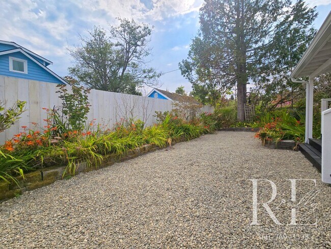 Building Photo - Private Beach Access – Bright, Breezy Livi...