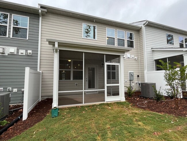 Building Photo - Newly Built 4BD, 3BA Cary Townhome with Modern Amenities and Screened-In Patio