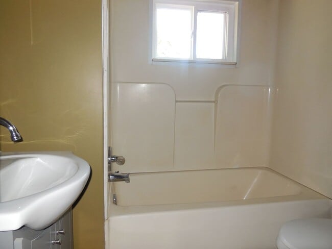 Building Photo - Two Bedroom Home with 3 Baths and W/D Hook...