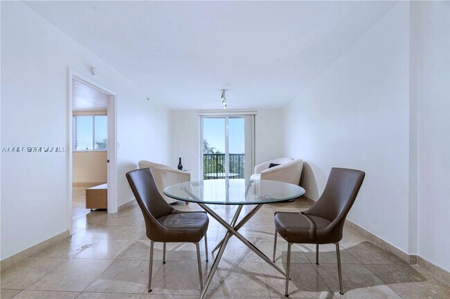 Building Photo - 8888 Collins Ave