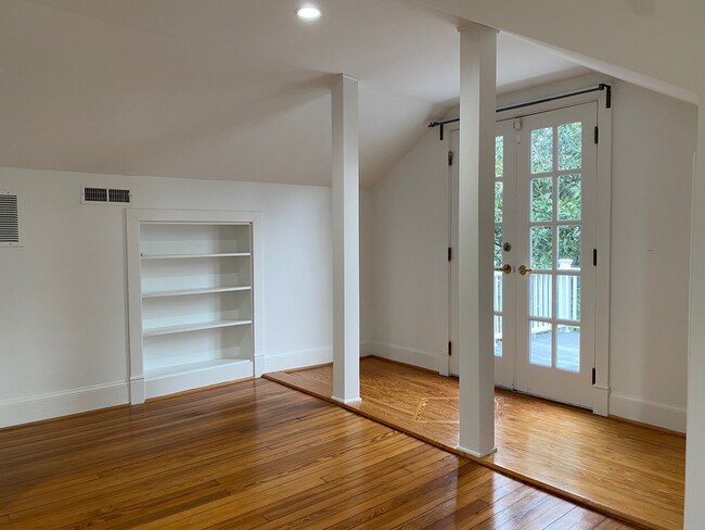 Upper level Bedroom #1. French doors to deck - 4809 Calvert Rd