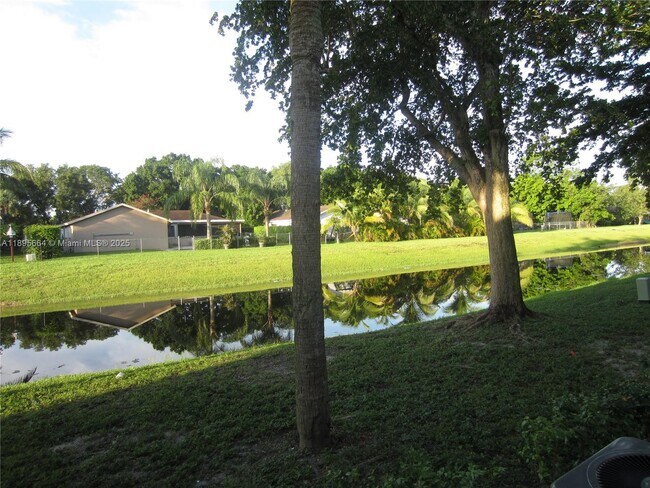 Building Photo - 10818 Royal Palm Blvd