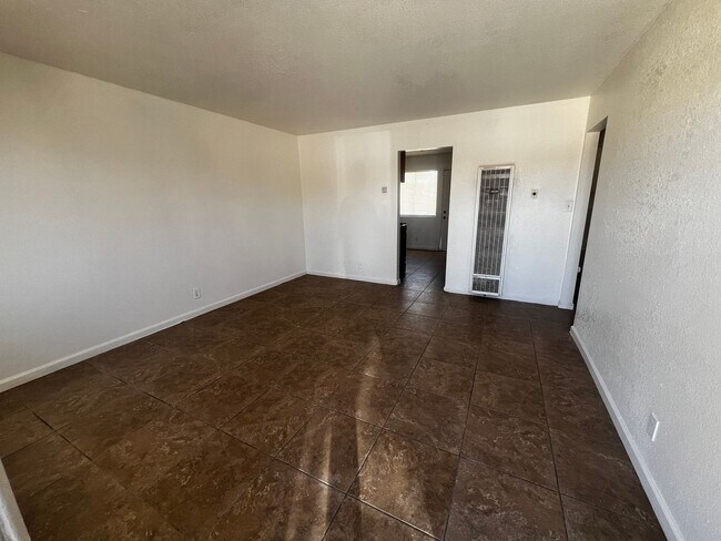 Building Photo - 6589 Palo Verde Ave