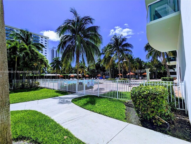 Building Photo - 19380 Collins Ave