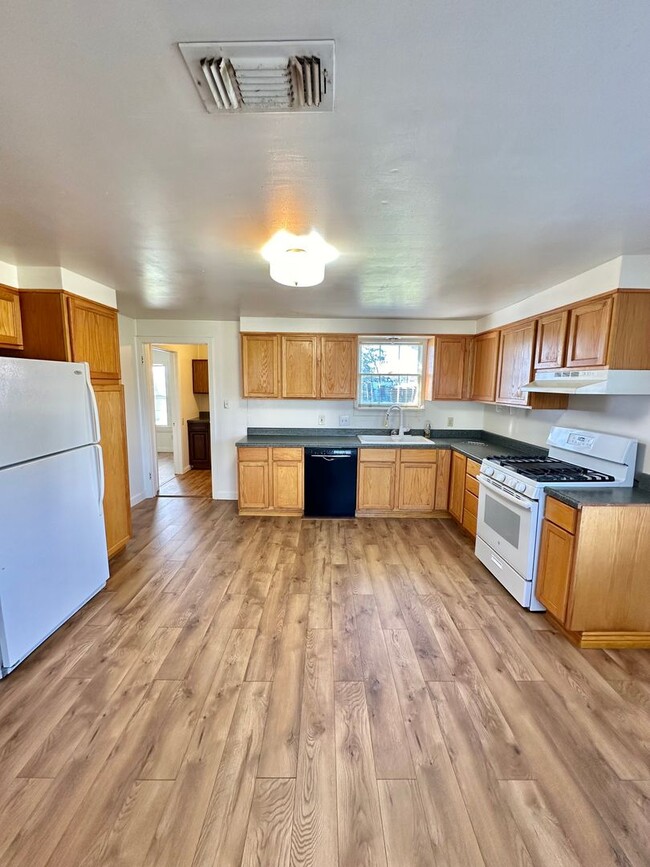 Building Photo - COMING MAY 2026! Charming 4-Bedroom Home + Huge Lot!