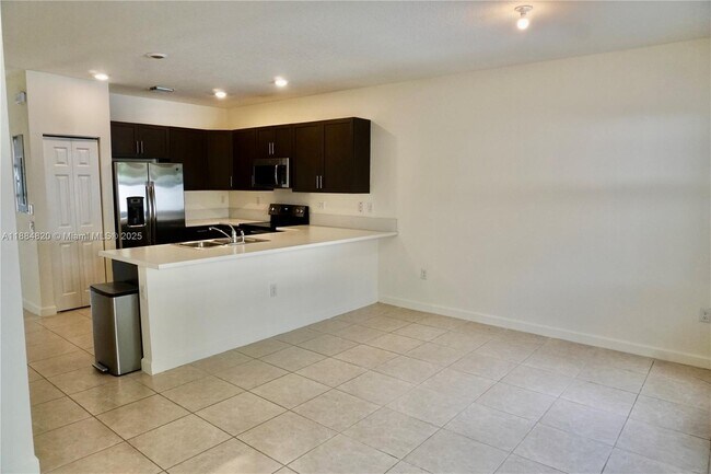Building Photo - 10606 West 33rd Ct