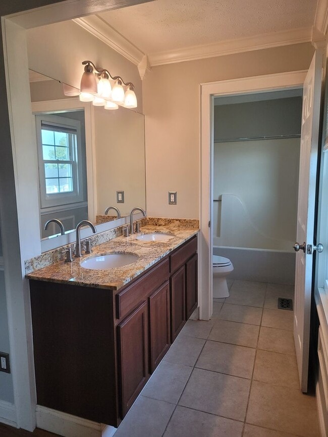 Building Photo - New to the Rental Market!  3 Bdrm/ 2.5 Bath Tri-Level Home! Located in Quiet Neighborhood!