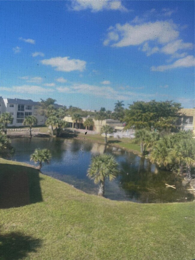 Building Photo - 8285 Sunrise Lakes Blvd